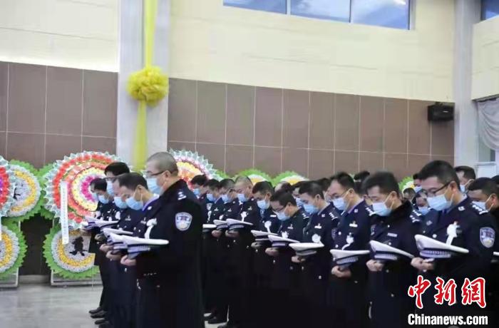 资料图为达德明追悼会现场。　青海省公安厅交警总队供图