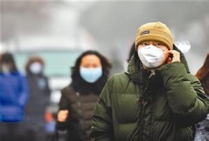 北京将“患流感戴口罩”入法 法治手段解决道德问题
