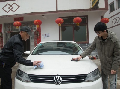 新春走基层|跨越90余载：两副对联，一样的横批