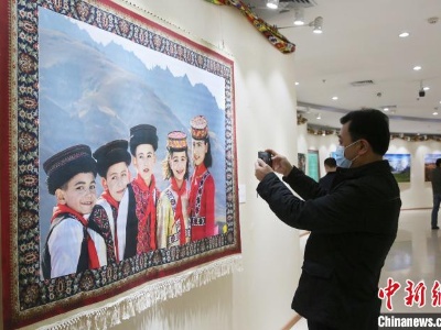 “天山放歌——新疆各族人民幸福生活”主题摄影展在京举办