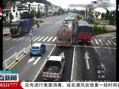 赣州：大货车碾压电动自行车 致人受伤