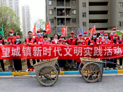 南昌市望城镇开展“三月春风十里，绿色正‘植’有你”植树活动