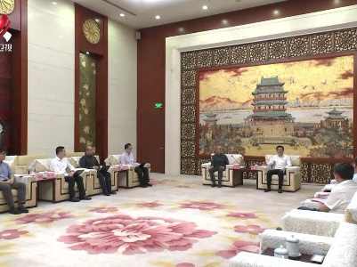 梁桂会见朱雀投资公司董事长