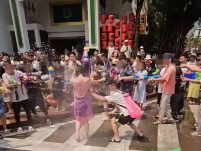 热评丨“泼水节雨衣遭撕扯”：节日狂欢也不能没有边界