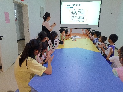【三比三争】靖安县税务局牵头社区网格举办“校园红绿灯 文明护成长”活动