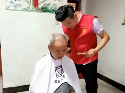 一把剪刀传大爱——记“吉安市劳动模范”习锋