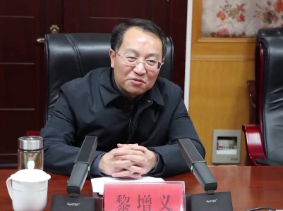 县委书记黎增义会见客商
