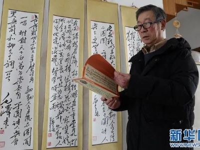 新华网“曝光”：铅山七旬老人“毛体书法”长卷献礼建党百年
