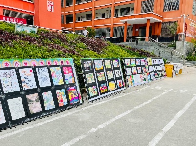 古市镇关工委联合古市镇小学开展“迎六一”书画作品展活动