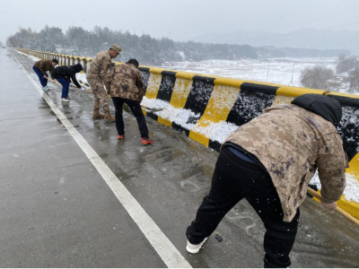  路口乡：除冰扫雪保畅通民兵带头共奋战
