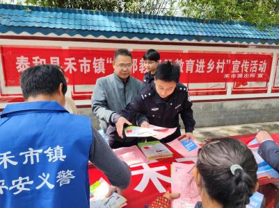 泰和县禾市镇江北村开展“对邪教说不”签名教育活动