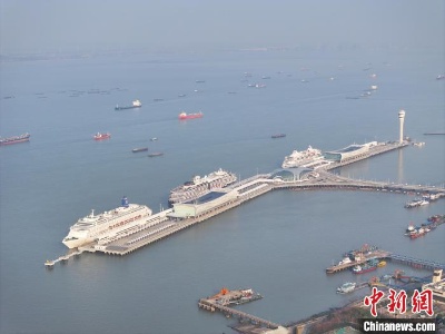 去年5月26日至今上海海关共监管邮轮214航次-中新网
