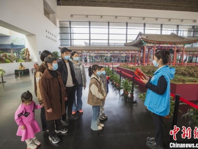 共建共享美好园林 北京市属公园开启学雷锋志愿服务活动-中新网