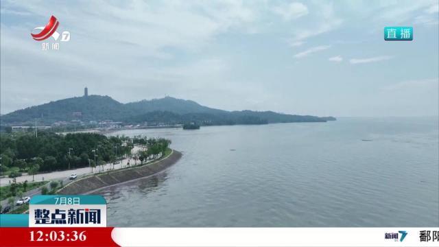 烈日下坚守 巡堤保安澜