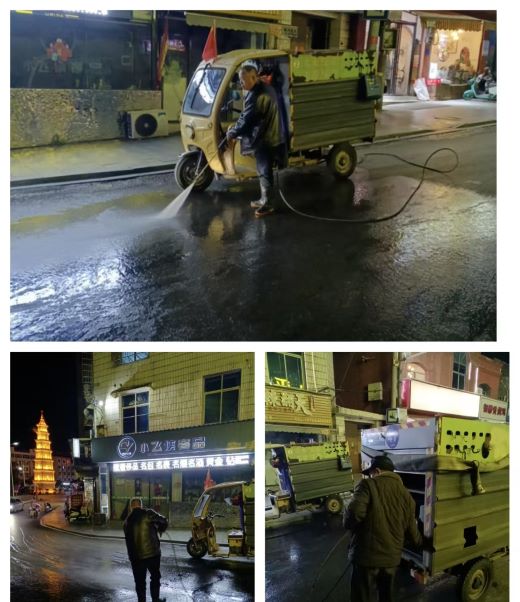 江西万载：路面油污污染 环卫工人连夜清理