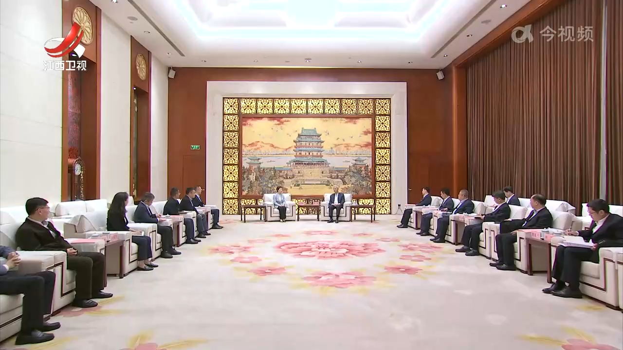 尹弘会见上海实业集团董事长冷伟青一行