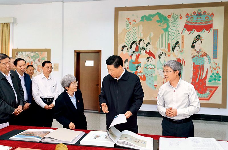 时政微视频丨习近平与世界遗产：敦煌情缘 