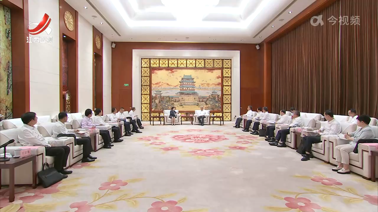 尹弘会见中国人保集团董事长丁向群